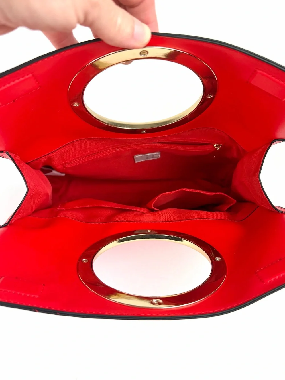 A New Day’s Foldover Metal Handle Clutch